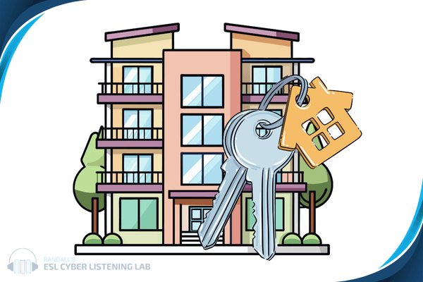 Apartment keys in front of the image of an apartment building